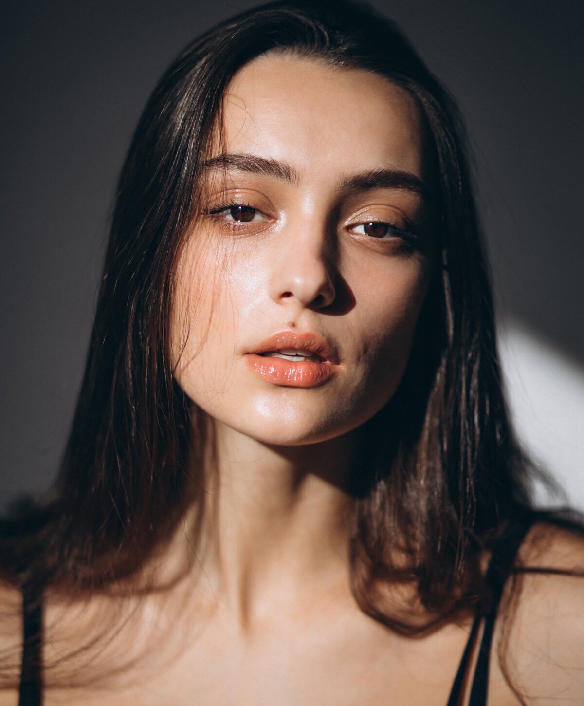 Long Island lip augmentation model with dark hair